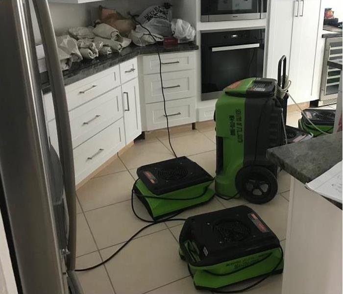 SERVPRO drying equipoment being used in kitchen