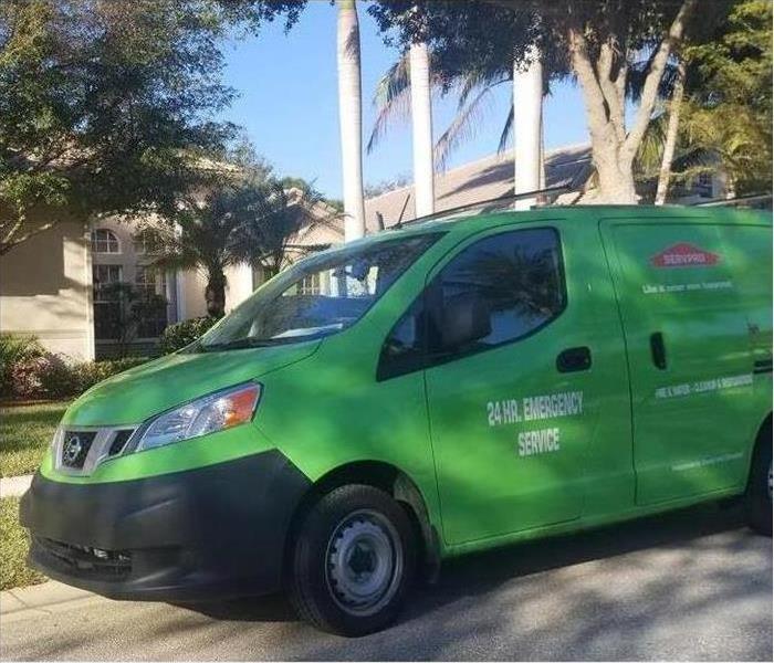 Our restoration van outside a home